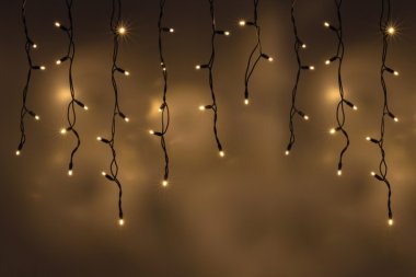 Фотография товара 'Teamprof Светодиодная бахрома 3х0.6м, статика, черный провод РЕЗИНА, теплая белая'